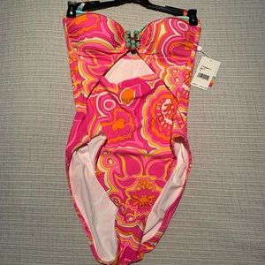 Trina Turk swimsuit size 4 brand new with tags. Missing  one stone.